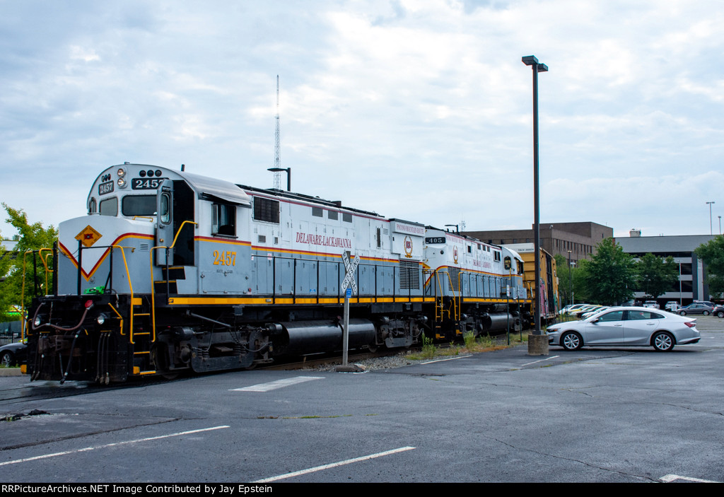 DL 2457 and another ALCo move through the Martz Bus Terminal parking lot